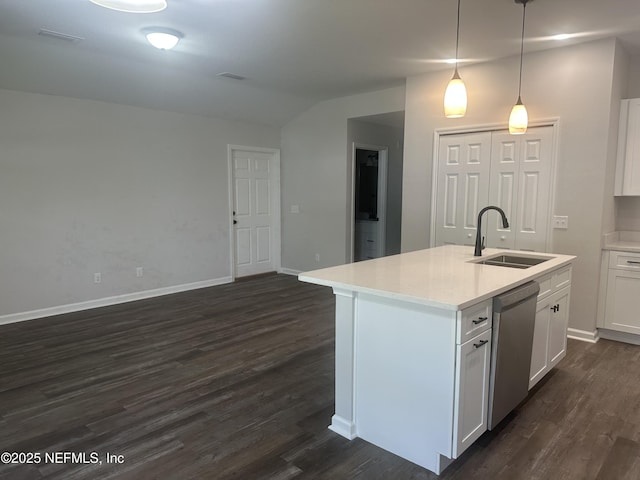 116 Moseley Ave, Palatka, FL 32177 - kitchen with a sink, dishwasher, dark wood finished floors, lofted ceiling, and white cabinetry