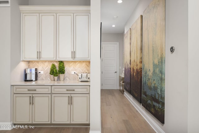 247 Vale Dr, Saint Augustine, FL 32095 - bar with decorative backsplash, light wood-style flooring, and recessed lighting