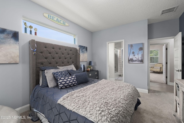 247 Vale Dr, Saint Augustine, FL 32095 - carpeted bedroom featuring baseboards, visible vents, a textured ceiling, and multiple windows