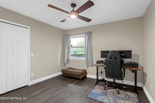 office area with baseboards, wood finished floors, and ceiling fan