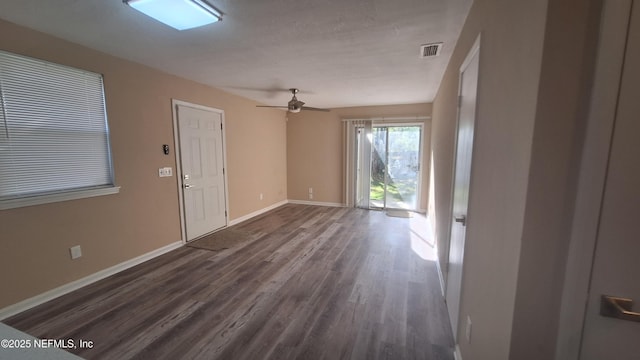 2756 Hidden Village Dr, Jacksonville, FL 32216 - interior space with ceiling fan, baseboards, dark wood finished floors, and visible vents
