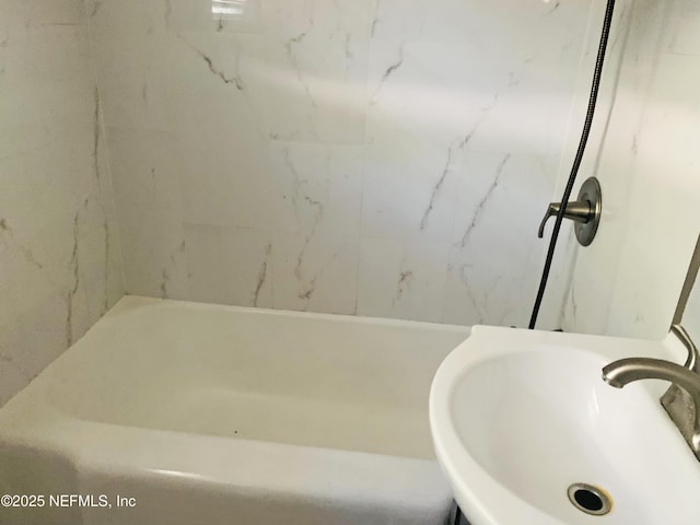 5133 Palmer Ave, Jacksonville, FL 32210 - full bathroom featuring a sink and a bathtub