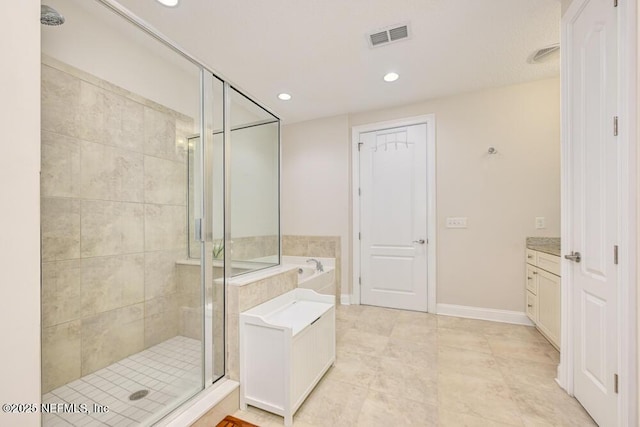 4300 S Beach Pkwy Unit 4205, Jacksonville Beach, FL 32250 - full bath featuring a garden tub, vanity, visible vents, recessed lighting, and a shower stall