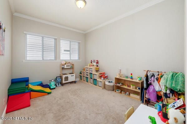 game room with carpet flooring and ornamental molding