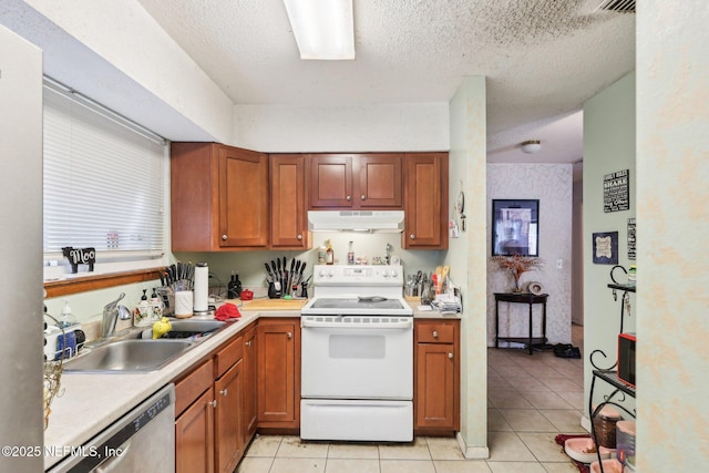 kitchen featuring white electric range oven, light tile patterned floors, a sink, and under cabinet range hood