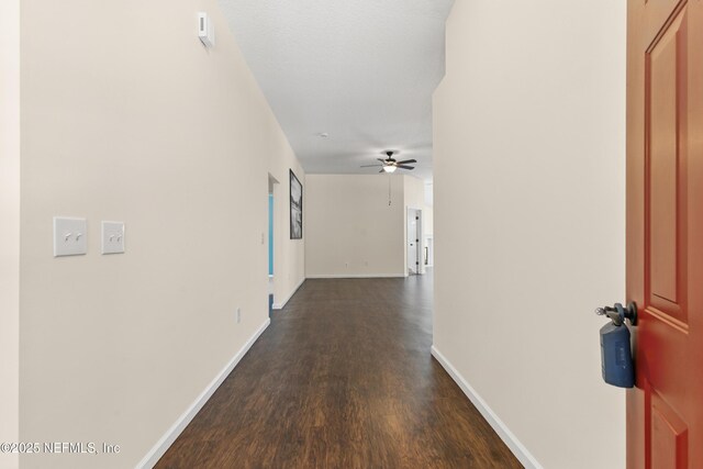 1217 Maclaren St, Saint Augustine, FL 32092 - corridor with baseboards and dark wood-style floors