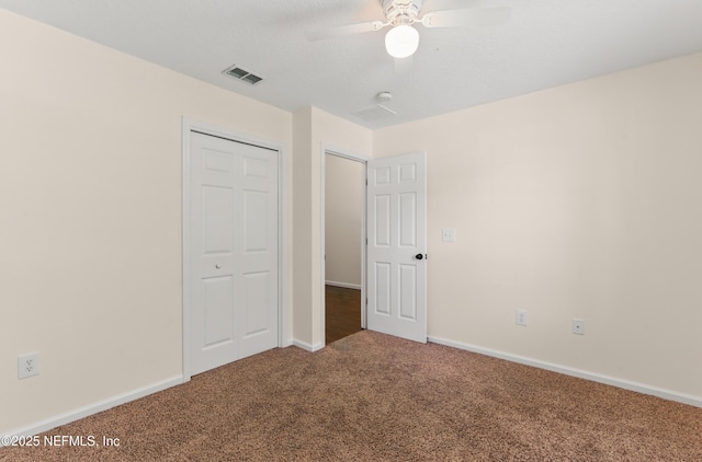 1217 Maclaren St, Saint Augustine, FL 32092 - unfurnished bedroom with a closet, baseboards, a ceiling fan, visible vents, and carpet