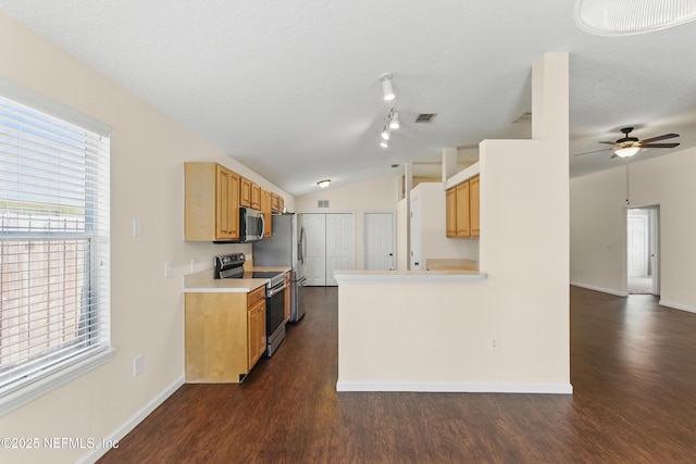 1217 Maclaren St, Saint Augustine, FL 32092 - kitchen with dark wood finished floors, a ceiling fan, appliances with stainless steel finishes, light countertops, and lofted ceiling