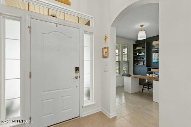 311 Wild Rose Dr, Saint Johns, FL 32259 - entrance foyer with arched walkways and baseboards