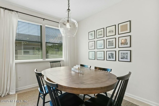 311 Wild Rose Dr, Saint Johns, FL 32259 - dining room featuring baseboards