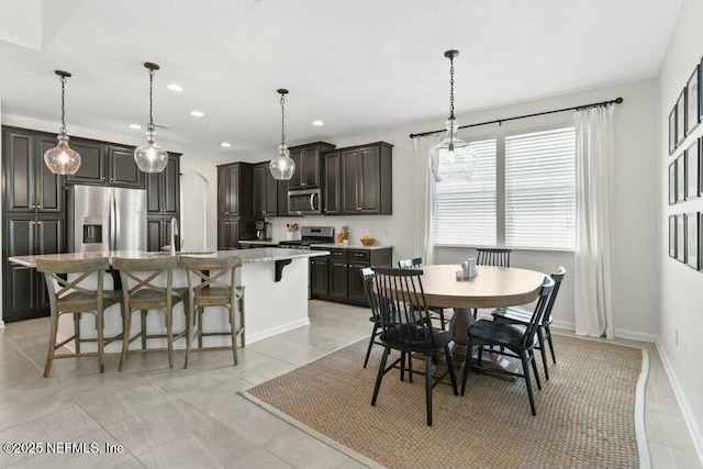311 Wild Rose Dr, Saint Johns, FL 32259 - dining room featuring baseboards, recessed lighting, and light tile patterned flooring
