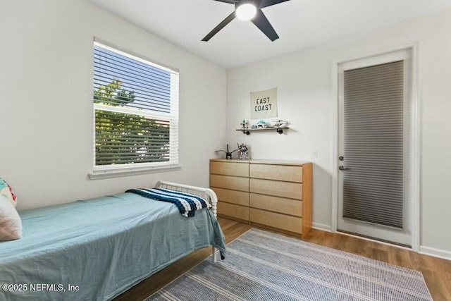 311 Wild Rose Dr, Saint Johns, FL 32259 - bedroom featuring wood finished floors, baseboards, and a ceiling fan