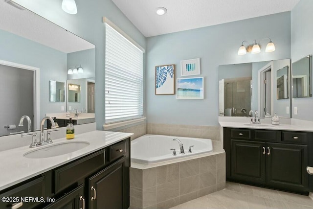 311 Wild Rose Dr, Saint Johns, FL 32259 - full bathroom featuring a sink, tile patterned floors, a bath, and a stall shower