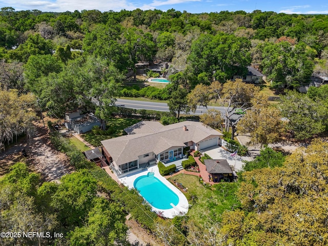 50 SE Forest St, Keystone Heights, FL 32656 - birds eye view of property featuring a forest view