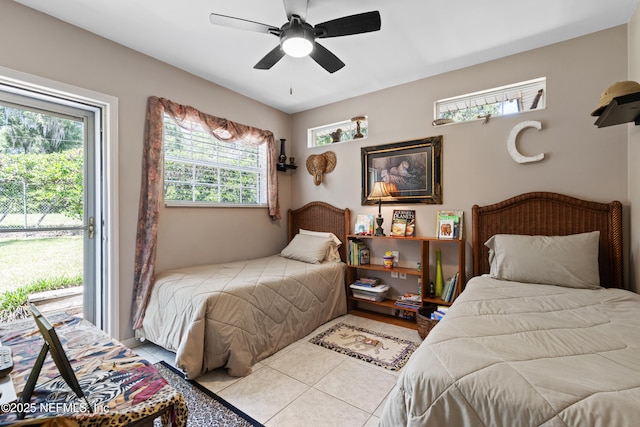 50 SE Forest St, Keystone Heights, FL 32656 - tiled bedroom featuring a ceiling fan