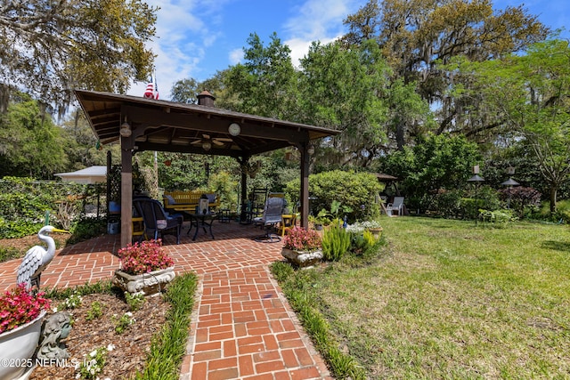 50 SE Forest St, Keystone Heights, FL 32656 - view of yard with a gazebo, ceiling fan, and a patio