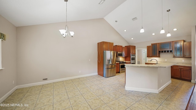 kitchen featuring a chandelier, glass insert cabinets, appliances with stainless steel finishes, high vaulted ceiling, and a sink