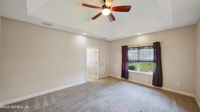 spare room featuring recessed lighting, baseboards, a ceiling fan, and carpet floors