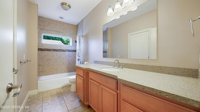 bathroom featuring tile patterned floors, vanity, shower / bath combination with curtain, and toilet