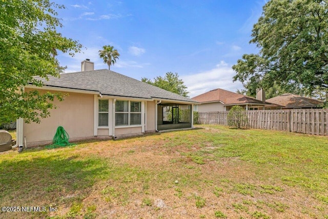 1029 Buttercup Dr, Saint Johns, FL 32259 - back of house featuring a chimney and a shingled roof
