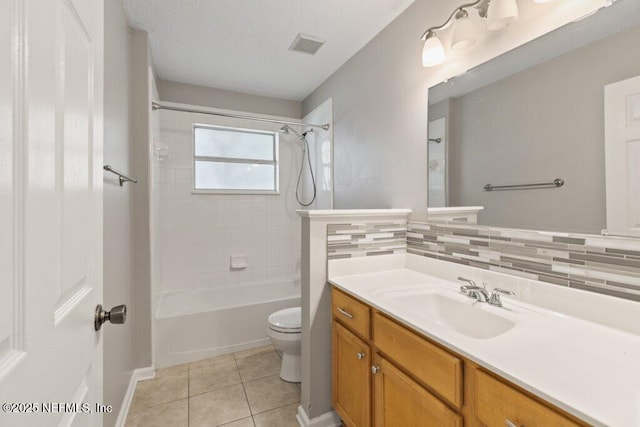 1029 Buttercup Dr, Saint Johns, FL 32259 - full bath with toilet, tile patterned flooring, vanity, bathing tub / shower combination, and backsplash