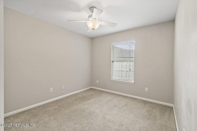 1029 Buttercup Dr, Saint Johns, FL 32259 - carpeted empty room with baseboards, a ceiling fan, and a textured ceiling