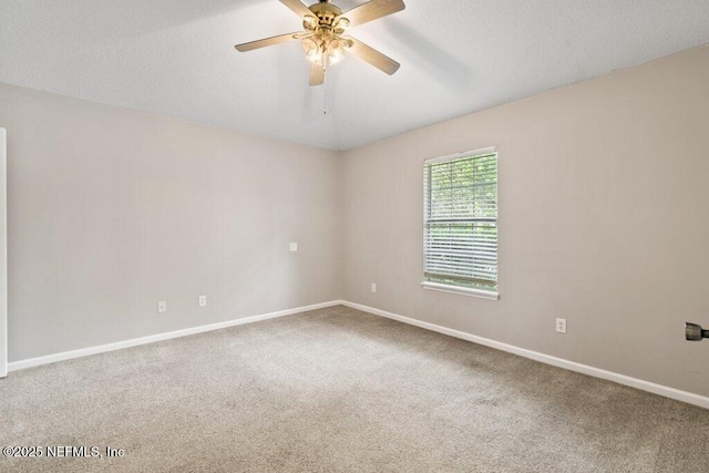 1029 Buttercup Dr, Saint Johns, FL 32259 - carpeted empty room featuring baseboards and a ceiling fan