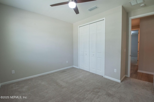 75309 White Rabbit Ave, Yulee, FL 32097 - unfurnished bedroom featuring carpet floors, a closet, and ceiling fan