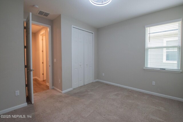 75309 White Rabbit Ave, Yulee, FL 32097 - unfurnished bedroom with carpet floors and a closet