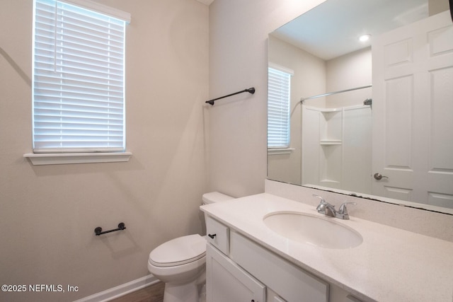 75309 White Rabbit Ave, Yulee, FL 32097 - full bathroom with vanity, a shower, and wood finished floors