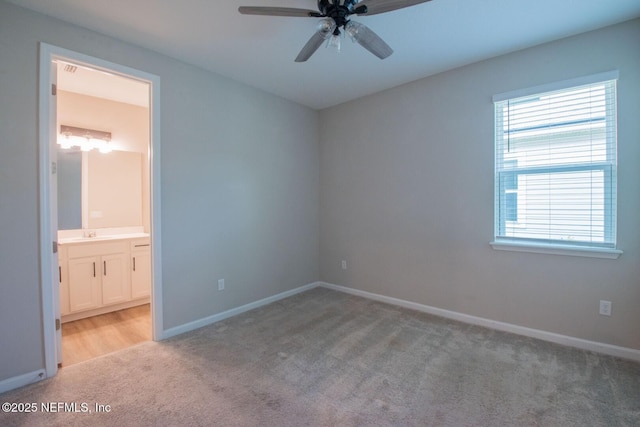 75309 White Rabbit Ave, Yulee, FL 32097 - unfurnished bedroom with light colored carpet and ensuite bathroom