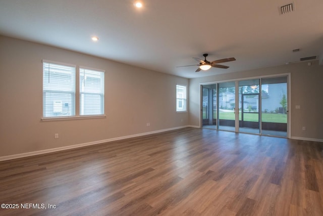 75309 White Rabbit Ave, Yulee, FL 32097 - spare room featuring ceiling fan, dark wood-type flooring, and recessed lighting