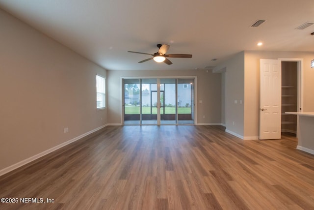 75309 White Rabbit Ave, Yulee, FL 32097 - unfurnished room with ceiling fan, wood finished floors, and recessed lighting