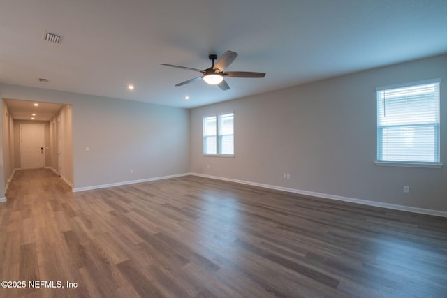 75309 White Rabbit Ave, Yulee, FL 32097 - unfurnished room with ceiling fan, wood finished floors, and recessed lighting