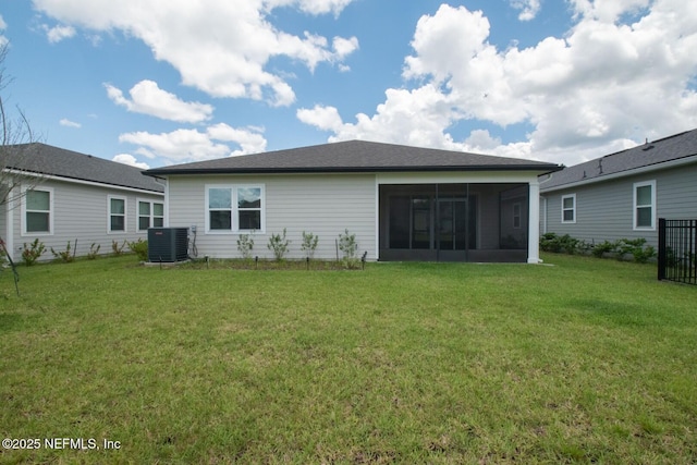 75309 White Rabbit Ave, Yulee, FL 32097 - rear view of property featuring a yard and a sunroom
