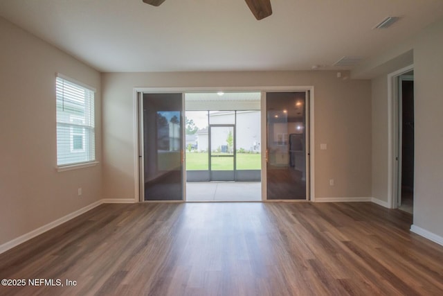 75309 White Rabbit Ave, Yulee, FL 32097 - unfurnished room featuring a ceiling fan and wood finished floors