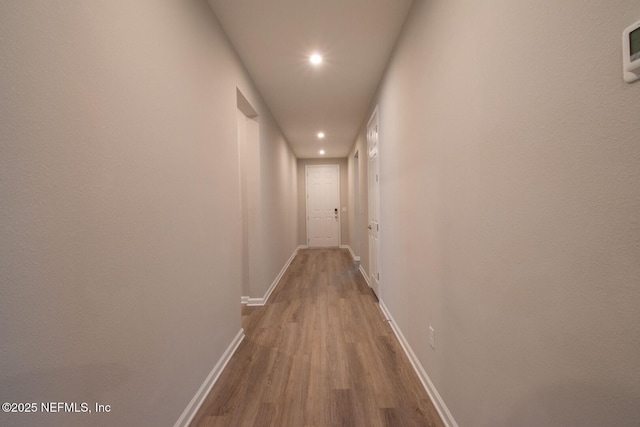 75309 White Rabbit Ave, Yulee, FL 32097 - hallway featuring recessed lighting and dark wood-style floors