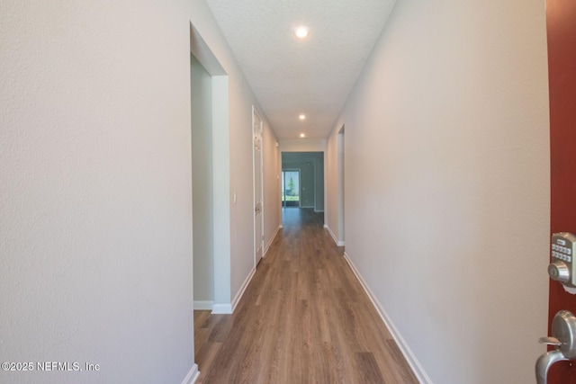 75309 White Rabbit Ave, Yulee, FL 32097 - hall featuring wood finished floors and recessed lighting