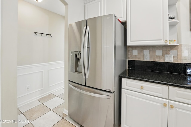 13738 Harbor Creek Pl, Jacksonville, FL 32224 - kitchen with stainless steel fridge with ice dispenser, light tile patterned floors, white cabinets, and open shelves