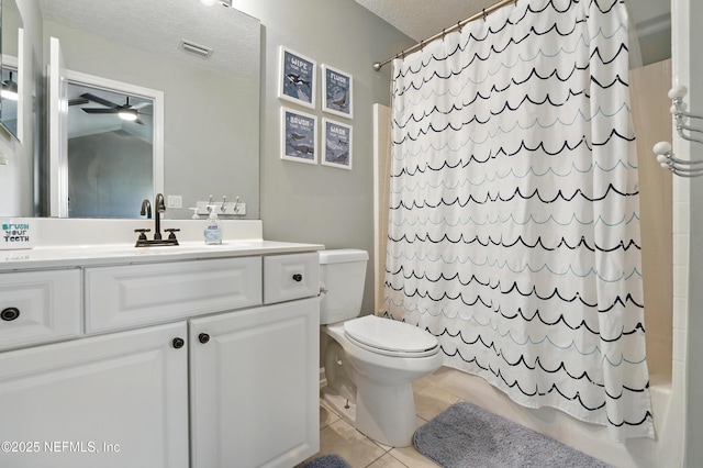 13738 Harbor Creek Pl, Jacksonville, FL 32224 - full bath with tile patterned flooring, a textured ceiling, toilet, and ceiling fan