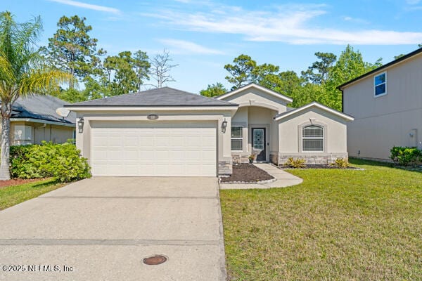 116 Timberwood Dr, Saint Augustine, FL 32084 - ranch-style home with a garage, concrete driveway, a front yard, and stucco siding