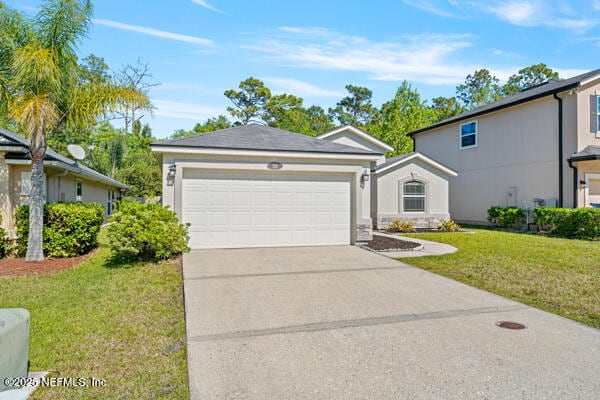 116 Timberwood Dr, Saint Augustine, FL 32084 - view of front facade with driveway, a front yard, and a garage