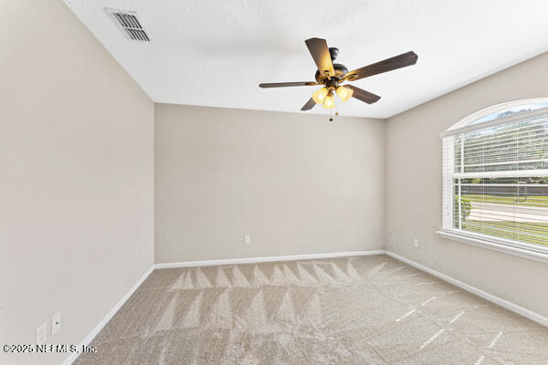 116 Timberwood Dr, Saint Augustine, FL 32084 - carpeted spare room with ceiling fan and baseboards