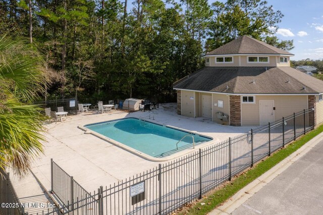 116 Timberwood Dr, Saint Augustine, FL 32084 - community pool featuring a patio area