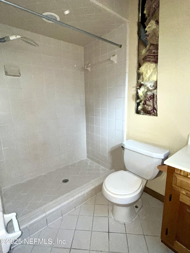 510 W Hillsborough Ave, Florahome, FL 32140 - bathroom featuring a shower stall, tile patterned floors, vanity, and toilet