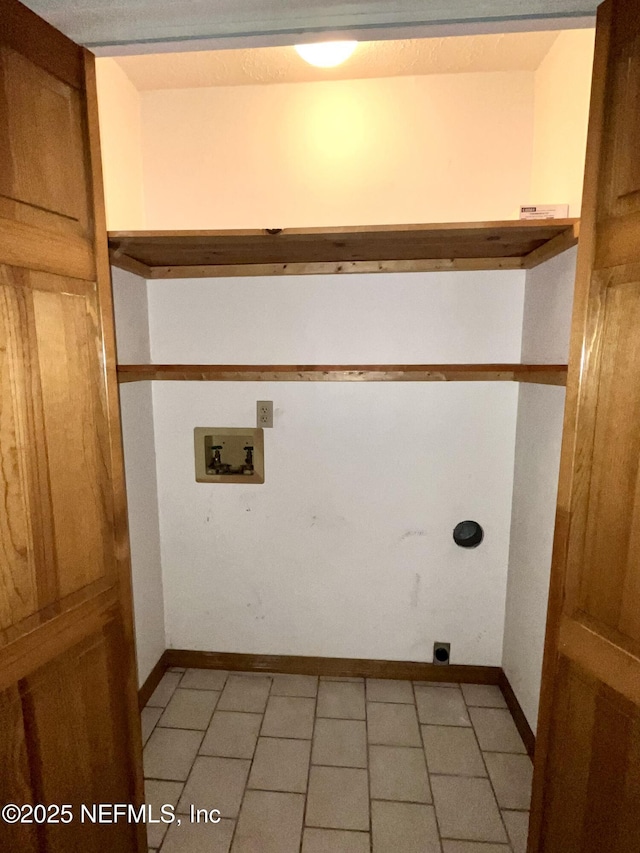 510 W Hillsborough Ave, Florahome, FL 32140 - laundry area with hookup for an electric dryer, laundry area, baseboards, and hookup for a washing machine