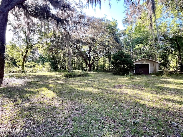 510 W Hillsborough Ave, Florahome, FL 32140 - view of yard with an outbuilding