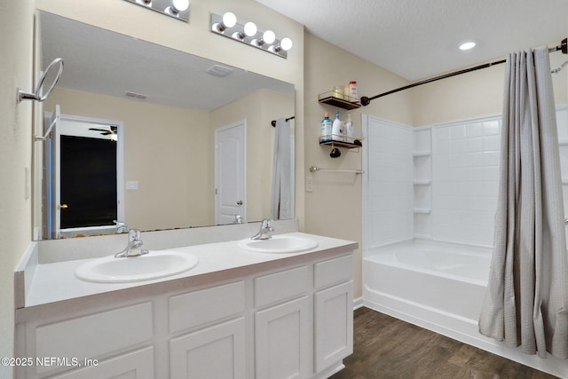2351 Oak Stream Dr, Green Cove Springs, FL 32043 - full bath with a sink, visible vents, shower / bath combo, and wood finished floors