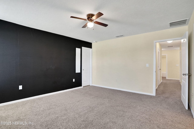 2351 Oak Stream Dr, Green Cove Springs, FL 32043 - carpeted empty room with visible vents, ceiling fan, and baseboards