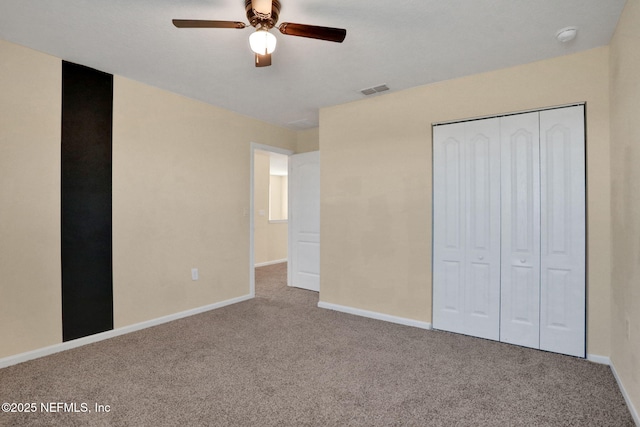 2351 Oak Stream Dr, Green Cove Springs, FL 32043 - unfurnished bedroom featuring a closet, baseboards, visible vents, and carpet floors